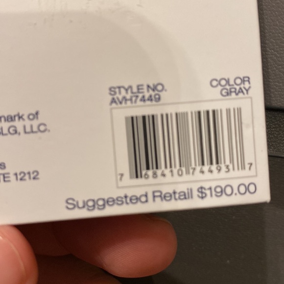 Purse with bow design on front. Brand new with tag. Gray purse. - Picture 9 of 16